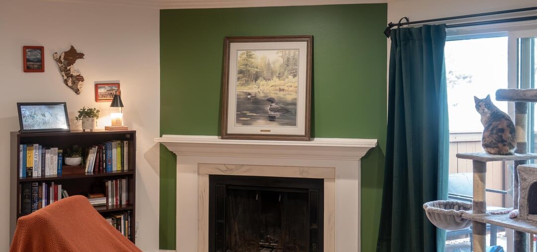 Decorating around big painting on mantle Decorating around big painting on mantle