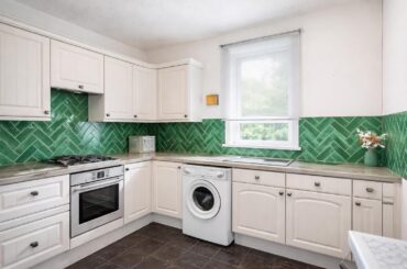 What colour cabinets would complement these tiles ?