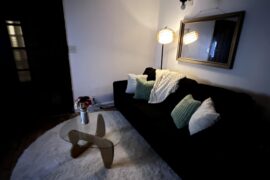 Any suggestions on what I should add to the bare wall next to the couch?