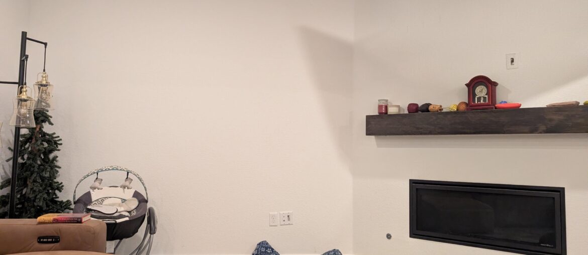 Help! Drawing a blank, trying to bring some life into builder grade livingroom.