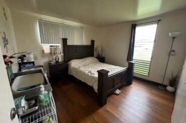 Just had a baby two months ago feeling overwhelmed with our bedroom. How can we make this feel more welcoming and less cluttered