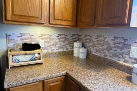 We’re renting long-ish term so I bought some of those peel and stick backsplash tiles!