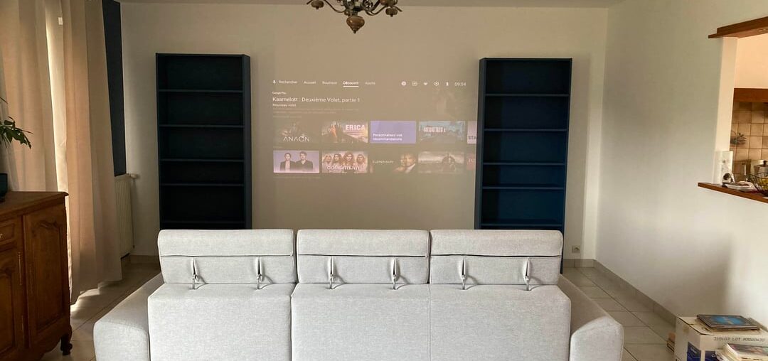 Bookcases on one wall or symetrical with TV inbetween ?