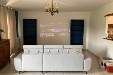 Bookcases on one wall or symetrical with TV inbetween ?