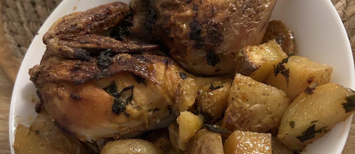 oven-roasted chicken and potatoes with herbs, butter, smocked paprika, garlic and honey for my family tonight