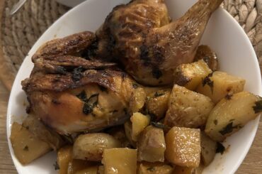 oven-roasted chicken and potatoes with herbs, butter, smocked paprika, garlic and honey for my family tonight