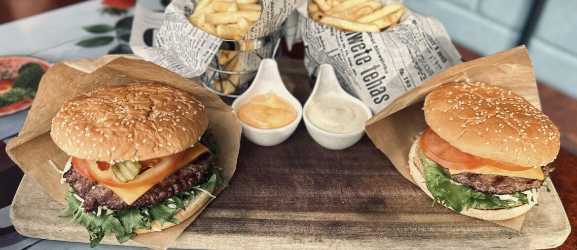 Meal for two: burgers, fries and sauces