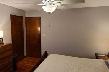 Ideas for what to hang on this big empty bedroom wall?