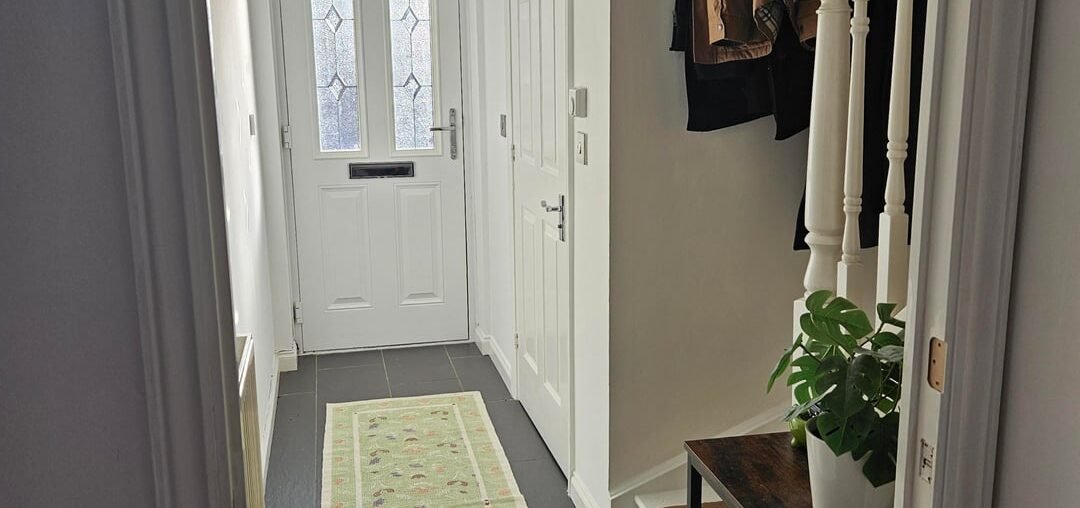 (Help) How could we make our hallway more cozy? Don't have much space for coats and shoe cabinet