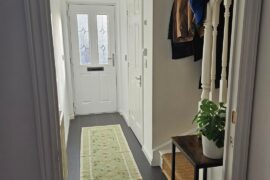 (Help) How could we make our hallway more cozy? Don't have much space for coats and shoe cabinet