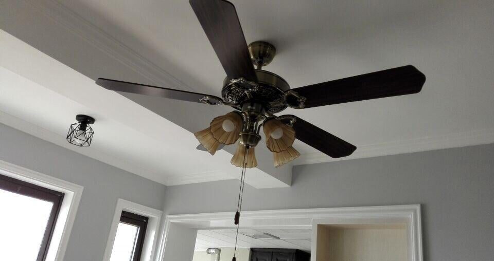 Which floor tile color goes best with blue-grey walls and black walnut furniture?