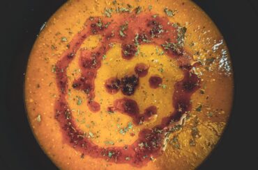 Mercimek Çorbası, a turkish soup of red lentiles with a paprika butter and dried mint as topping