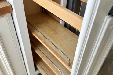 Just moved in… need help organizing this pull-out cabinet.