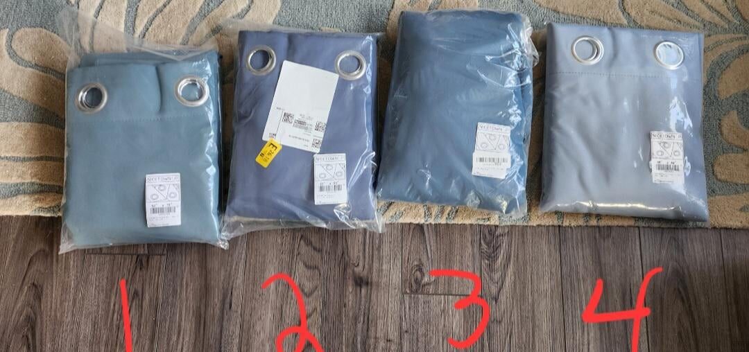 Which curtain compliments the tone without clashing?