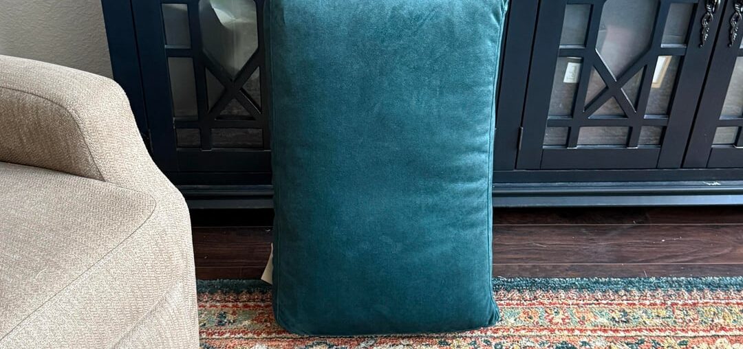 Would a chair in this teal work with the rug and cabinet?