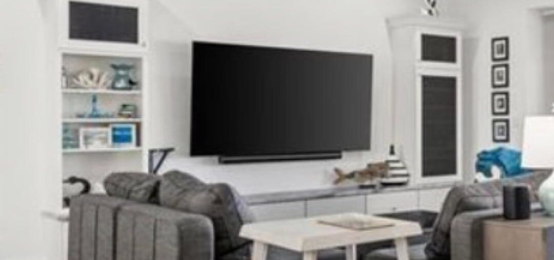 What if anything (slat board?) should I put behind the tv / between the cabinets? What color and how high?