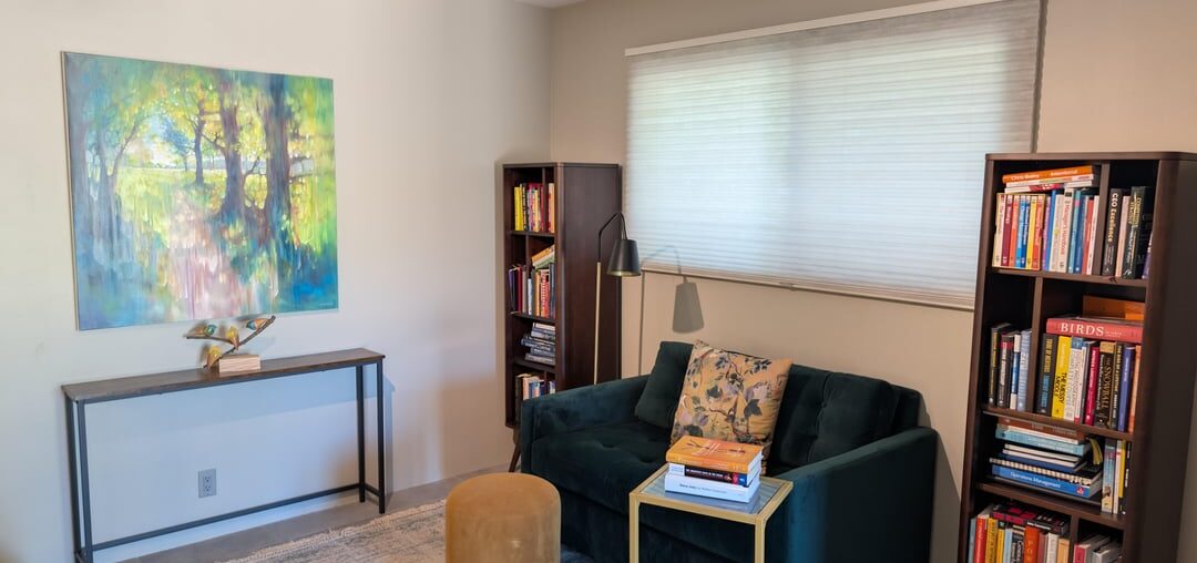 Should I remove the console table and just hang the painting lower?