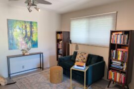 Should I remove the console table and just hang the painting lower?