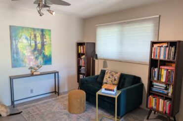 Should I remove the console table and just hang the painting lower?