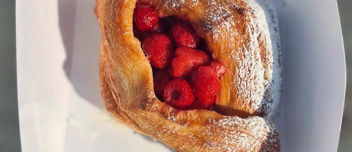 Pastry with custard cream and raspberries