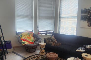 How should I add curtains? Tension rods in the window bay or regular curtains rods hung in front?