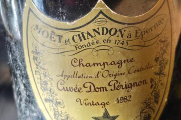 Found this bottle when cleaning out a family member's house, is it worth anything? Or should I just open it?