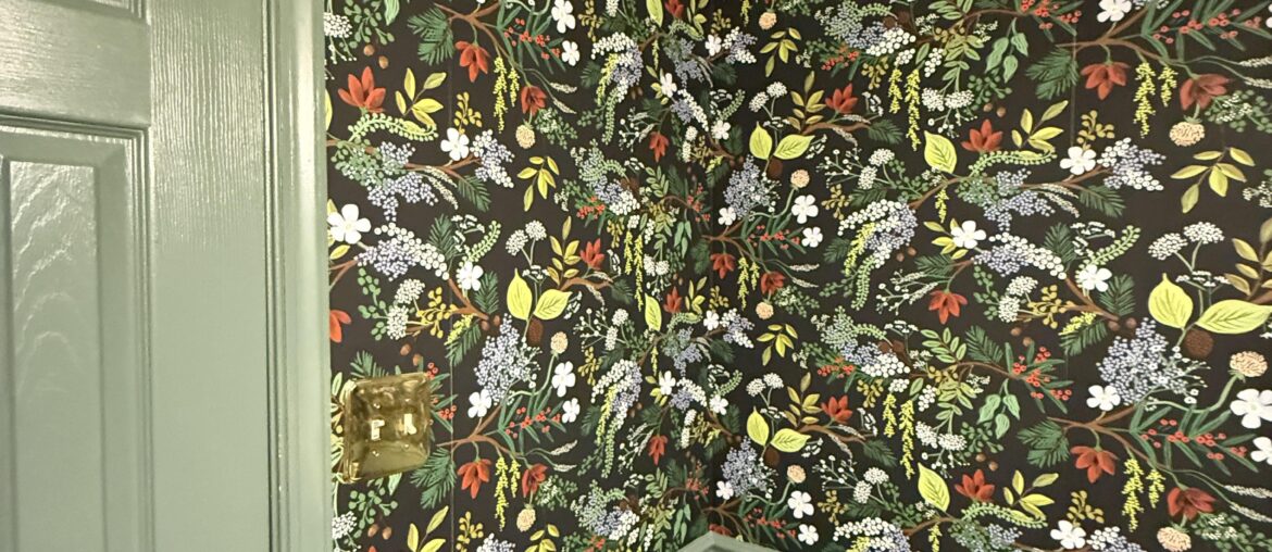 Art help for busy bathroom wallpaper