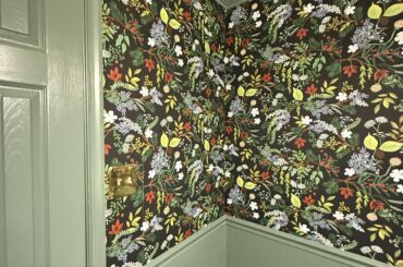 Art help for busy bathroom wallpaper