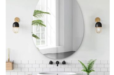 What kind of bathroom vanity lights would suit this mirror?