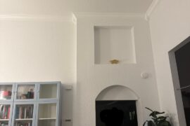 What to do with this awkward wall niche (with light fixture)?