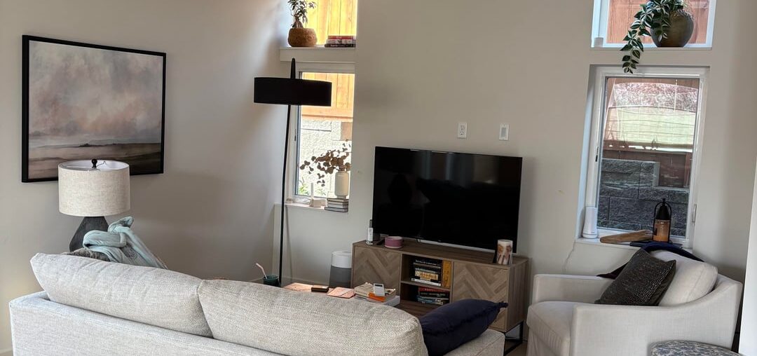 Fireplace size help - fill the wall or leave space?