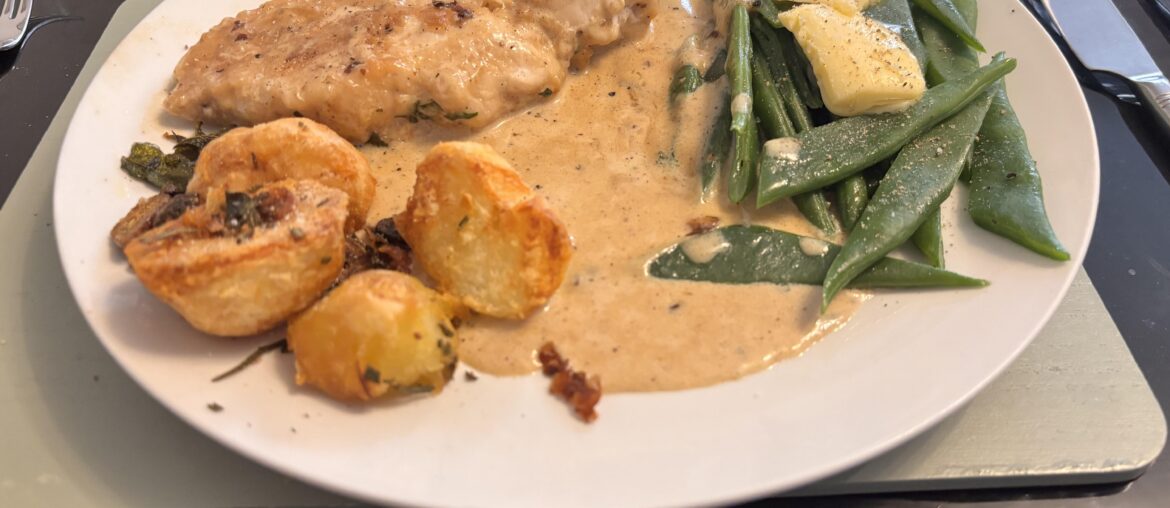 Chicken in white wine, cream & tarragon sauce.