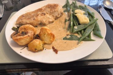 Chicken in white wine, cream & tarragon sauce.