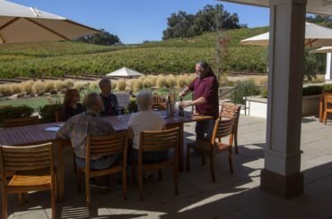 A controversial California winery owner settles sexual harassment lawsuit connected to its most famous estate