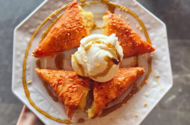 Warm banana in crispy batter with ice cream