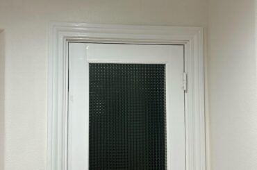 Looking to add curtain to French door