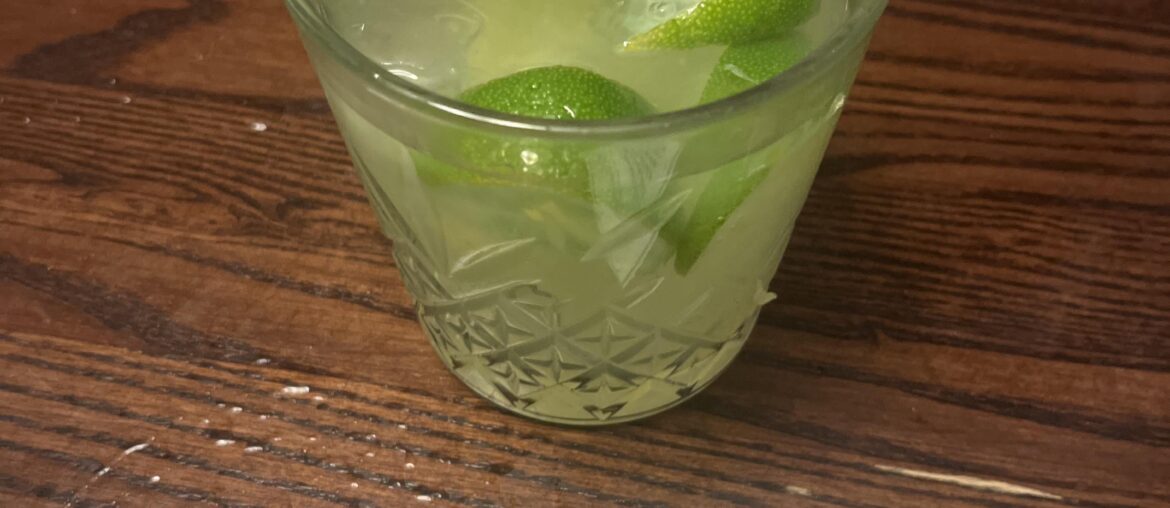 White whine, lime, ice cubes, good people, good times. Have wine an evening yall.