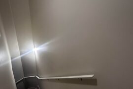 What would look good on the wall above railing?