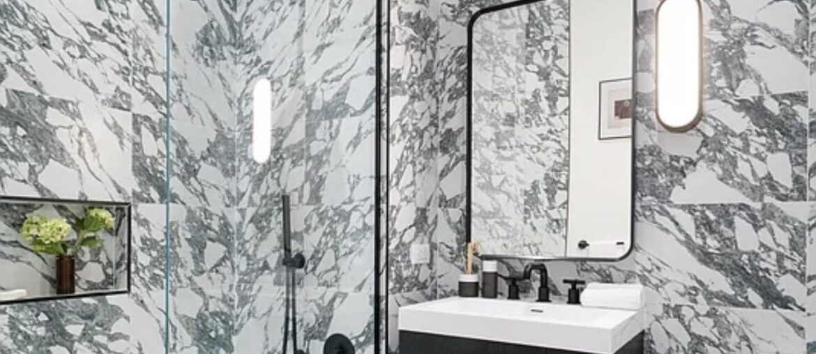 Wall options for covering very LOUD marble in bathroom