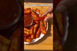 Spicy garlic French fries #trendingvideo #food #cookingideas #recipe