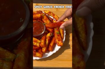 Spicy garlic French fries #trendingvideo #food #cookingideas #recipe