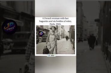 A French woman with her baguette and six bottles of wine, Paris, 1945.