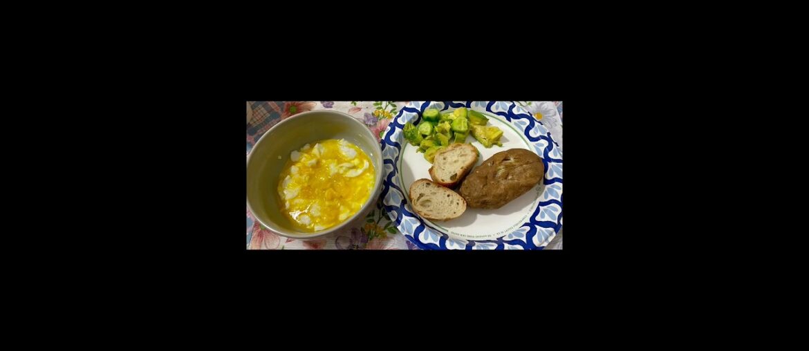 Wednesday dinner: eggs, baked potato, French bread, avocado, and crunchers.