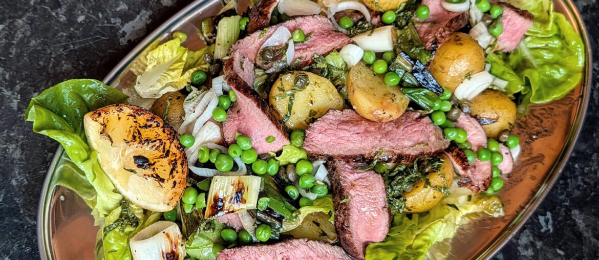 BBQ lamb and spring onions, new potatoes, peas & mint