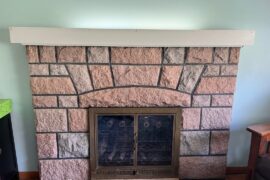 Is there anything I can do (cheaply) to make this fireplace not so dated-looking?