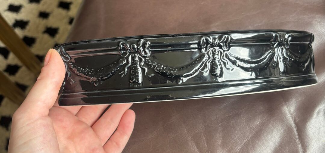 How can I style this odd piece of decor?