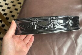 How can I style this odd piece of decor?