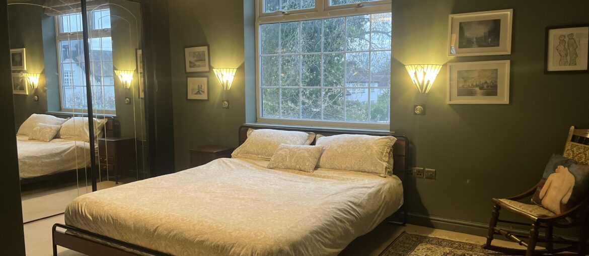 Help needed. Should I add a bedside cabinet, or shelf on the right of the bed and what colour of bedspread would you recommend?