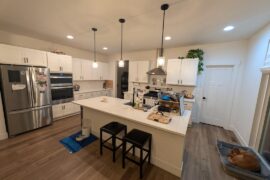 How do I style this very black and white kitchen?