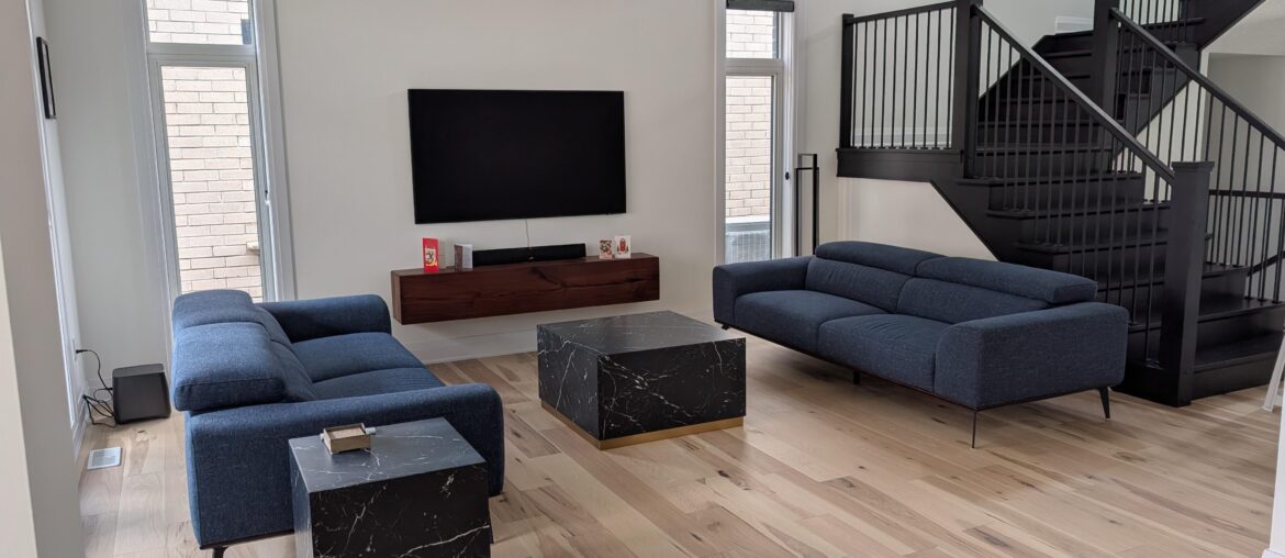 Rug or no-rug? Really love our hard wood floors but room is not cozy.